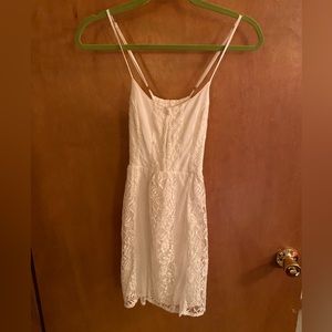 Summery white strappy dress with lace detail